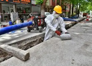 Licensed asbestos assessor Perth collecting samples